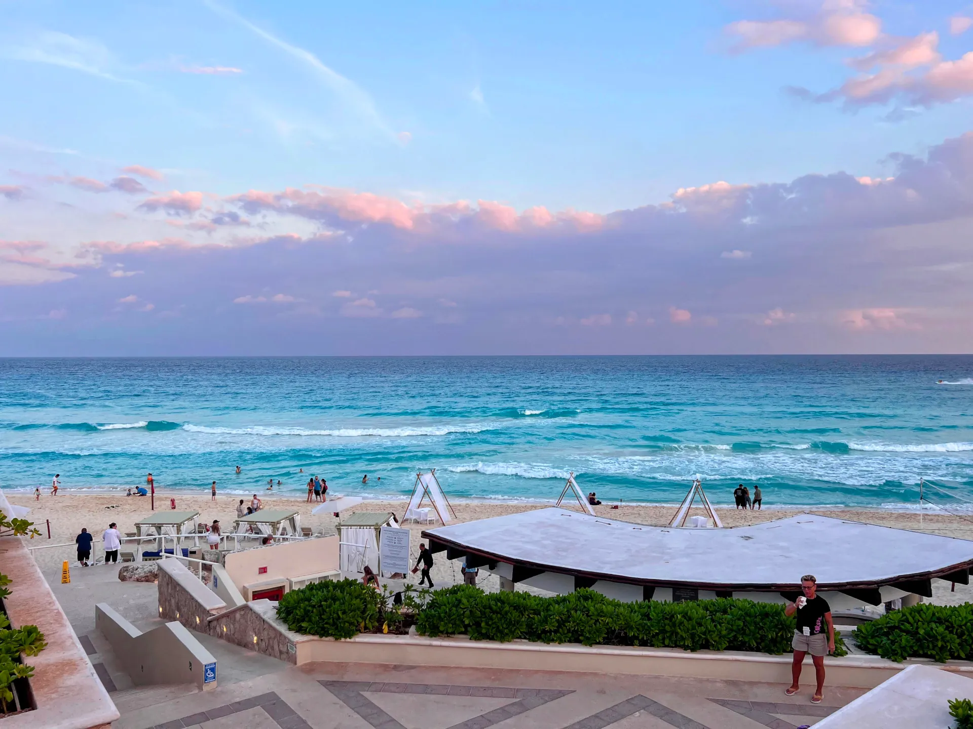 View of the beach from the hotel pools